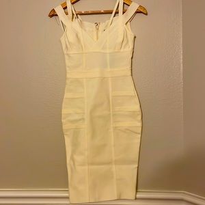 Cream bandage dress xs but Fits a small like a bodycon